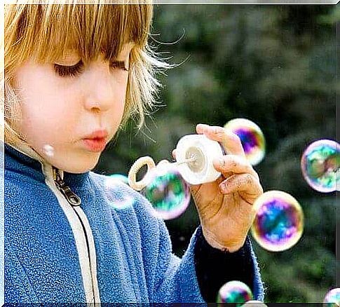 child with bubbles