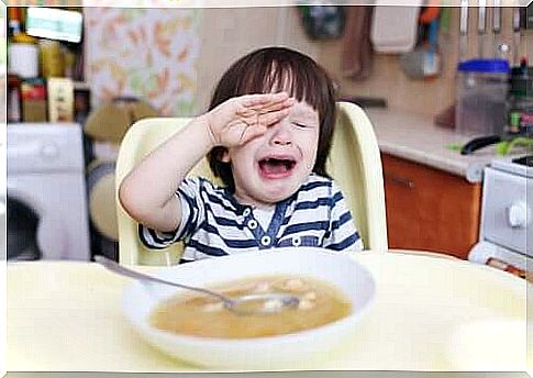 Child throwing tantrums with food.