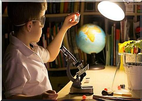 the theory of learning experience as a child studying with a microscope.