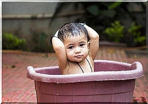 Child taking a bath