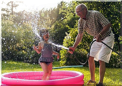 grandfather-and-granddaughter-in-the-pool