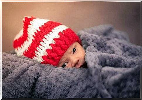 Newborn with bonnet