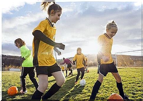little girls playing soccer 