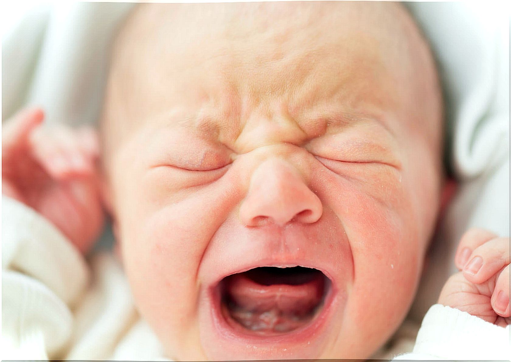 Baby crying is a form of communication.  Don't ignore it.
