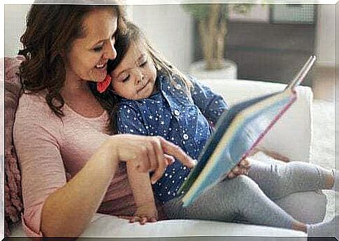 Mother reading to her daughter