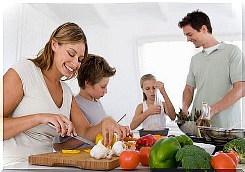 Children help prepare dinner