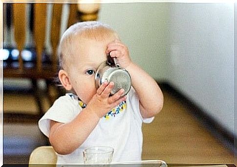 Child drinks from the cup